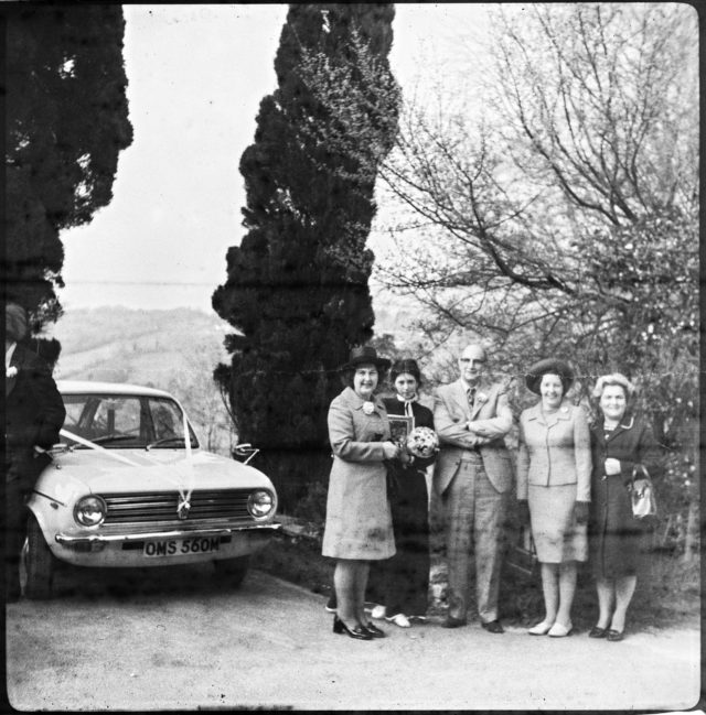 The lost film - Probably a Scottish wedding from 1973. - The car is an Austin Maxi, made in England between 1969 and 1981, and this particular one, it seems it was made in the first part of the interval, judging by the mirrors position. The plate was first registered in Edinburgh, somewhere between August 1973 and July 1974.