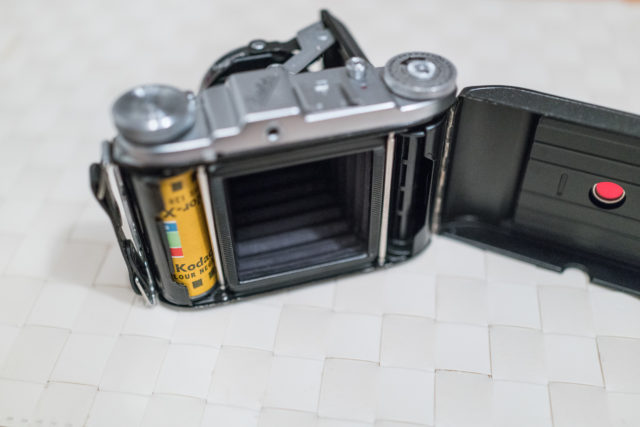 Balda Baldix 75mm f2,9 Baltar lens, folding camera, with the Kodacolor X colour negative roll-film inside.